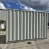 12ft opslagcontainer met vorkzakken en oproldeur